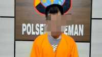 tersangka sabu Polsek Kateman Inhil Polsek Kateman tangkap pria memiliki 14 paket sabu dan pil ekstasi. Tersangka HS setelah diamankan polisi. (foto: abd)