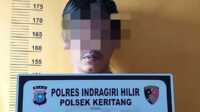 pengedar sabu di kotabaru Tersangka pengedar sabu di Kotabaru, PR, setelah diamankan polisi. (foto: istimewa)