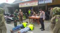 Operasi Prokes di Selatpanjang Kepulauan Meranti Provinsi Riau, pelanggar dihukum push up dan baca Al-Fatihah. (foto: burhan)