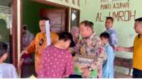 ditreskrimum Polda sumsel bakti sosial Dirreskrimum Polda Sumsel menyerahkan bantuan dalam bakti sosial di anak yatim di Panti Asuhan Al Umroh, Jumat (9/12/2022). (Foto: JurnalTerkini.id/alam budi kusuma
