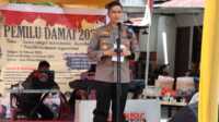 Kapolres Asahan AKBP Roman Smaradhana Elhaj membuka Lomba Mural Pemilu Damai 2024, yang diselenggarakan oleh Perhimpunan Mahasiswa Asahan Seluruh Indonesia (Permasi) Kabupaten Asahan, Kamis (16/02/2023). (JurnalTerkini.id/rizki)