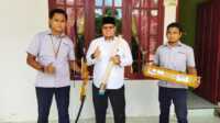 Manajemen PT Timah menyalurkan bantuan untuk Ponpes Tahfidzul Quran An Nur, Sungai Ungar, Kecamatan Kundur, Selasa (7/3/2023). (Dok PT Timah)