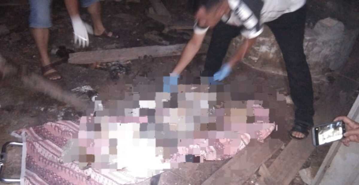 Polisi mengidentifikasi mayat laki-laki tanpa identitas yang ditemukan dalam rumah walet di Kisaran, Sabtu (11/3/2023). (JurnalTerkini.id/rizki)