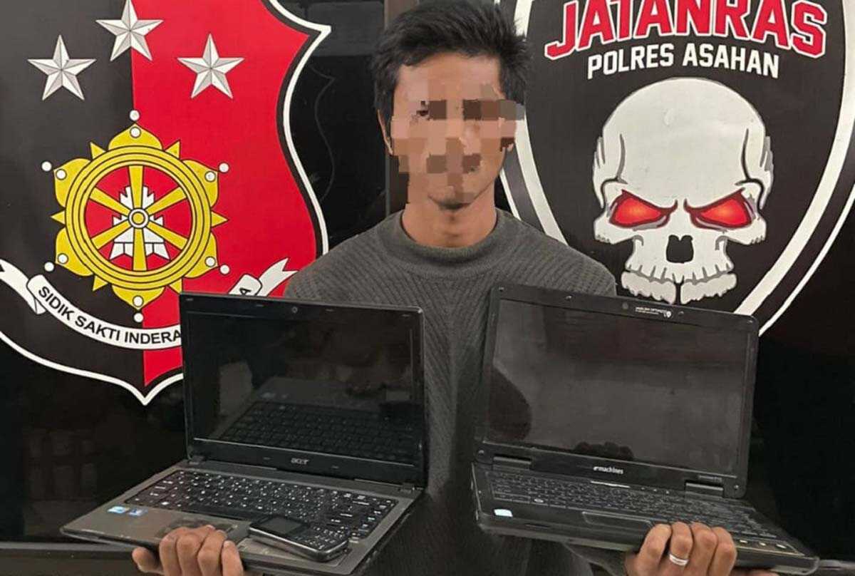 Tersangka AMN alias An beserta barang bukti setelah diamankan di Mapolres Asahan, Kamis (2/3/2023). (foto ist)
