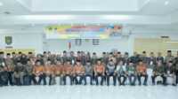 pwri Asahan Bupati Asahan Surya berfoto bersama pengurus PWRI masa bhakti 2023-2027 usai dilantik di Aula Melati Kantor Bupati Asahan, Kamis (9/3/2023). (Foto: istimewa)
