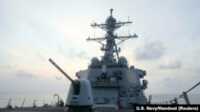 kapal perusak Amerika Serikat Kapal perusak berpeluru kendali kelas Arleigh Burke USS Milius (DDG-69), dikerahkan ke area operasi Armada ke-7 A.S., dalam operasi yang sedang berlangsung, di lokasi yang dirahasiakan di Laut China Selatan, 10 April 2023. (US Navy/Handout via REUTERS)