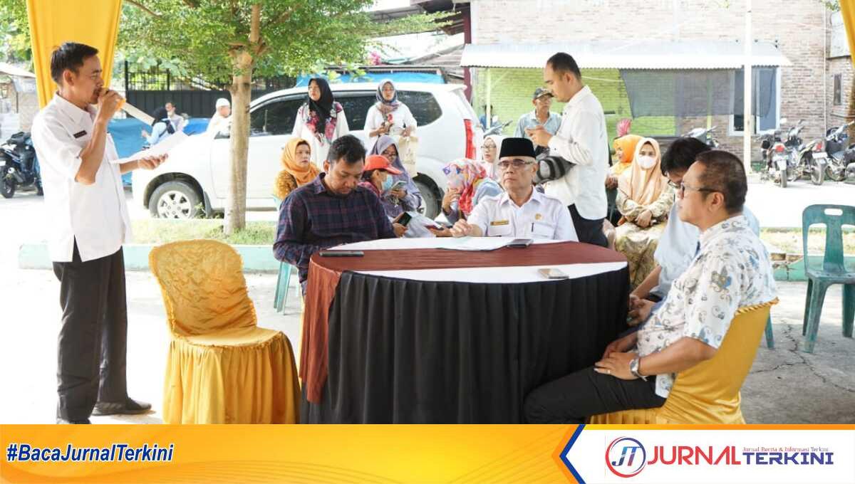 operasi pasar asahan Pemkab Asahan menggelar operasi pasar reguler dan pasar khusus di Kelurahan Kedai Ledang Kecamatan Kota Kisaran Timur, Rabu (12/04/2023). (JurnalTerkini.id/rizki)