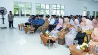 Jamaah Calon Haji Asahan Acara upah upah dan syukuran jamaah calon haji dari keluarga besar Dinas Pendidikan Kabupaten Asahan di aula Dinas Pendidikan Asahan, Senin (22/5/2023). (JurnalTerkini.id/rizki)