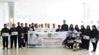 pelepasan atlet NPC Asahan ke perpaprov sumut Bupati Asahan H Surya berfoto bersama atlet NPC Asahan yang akan bertanding di Peparprov Sumatera Utara usai acara pelepasan di rumah dinasnya, Rabu (10/5/2023). (Foto istimewa)
