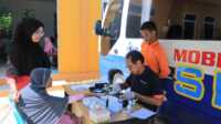 mobil sehat pt timah Mobil sehat PT Timah Tbk melayani pemeriksaan kesehatan gratis untuk warga Desa Perayun, Kecamatan Kundur Utara, Kabupaten Karimun, Kepulauan Riau, Kamis (23/6/2023). (Dok, Humas PT Timah)
