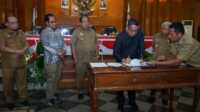 rapat paripurna dprd asahan Penandatanganan pengesahan Ranperda Laporan Pertanggungjawaban Pelaksanaan APBD 2022 dalam rapat paripurna DPRD Asahan, Selasa (4/7/2023). (Dok. Pribadi)