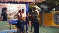 HUT RI di Kampung Baru Tebing Penyerahan hadiah kepada para pemenang lomba memperingati HUR RI ke-78 di Kampung Kali Baru, Kelurahan Sei Lakam Timur, Kecamatan Karimun, Minggu (27/8/2023) malam. (JurnalTerkini.id/jansen)