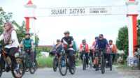 gowes sepeda Bupati Asahan Bupati Asahan dengan OPD , Ketua TP PKK Asahan beserta pengurus dan komunitas sepeda Gowes bersama dalam rangka memeriahkan HUT RI yang ke-78 yang di mulai dari depan rumah dinas Bupati Asahan dan finis di Kantor Camat Meranti, Minggu (20/08/2023). (Dok Diskominfo Asahan)