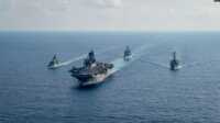 angkatan laut as dan australia Angkatan Laut A.S. dan Angkatan Laut Kerajaan Australia bekerja sama di Laut Cina Selatan. (Foto: Ilustrasi via Reuters)
