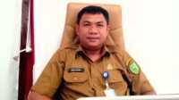 Kepala Bagian Ekonomi dan Sumber Daya Alam Sekretariat Daerah Natuna, Wan Syazali saat dijumpai di ruangan kerjanya. (foto : jr ronald)