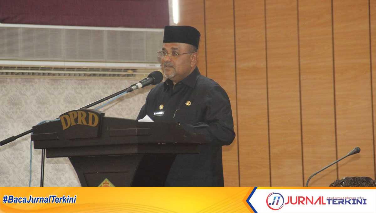 Bupati Karimun Aunur Rafiq LKPJ dan RPJPD Bupati Karimun Aunur Rafiq membeberkan realisasi belanja daerah pada 2023 dalam rapat paripurna di gedung DPRD, Rabu (12/6/2024). (jurnalterkini.id/edy)