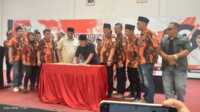 pemuda pancasila tegal dukung ischak-kholid Pemuda Pancasila (PP) Kabupaten Tegal Mendeklarasikan dukungan untuk Paslon Ischak-Kholid, Rabu 02/10/2024 di Lasnur Convention Hall-Slawi (Foto: Jurnalterkini.id/Supriyadi)