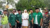 Bupati Demak Esti'anah bersama Banser dan warga NU Demak di Harlah NU ke -102 di Alun-alun Demak. (JurnalTerkini.id/Ponco)