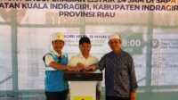 IMG-20250316-WA0001 Gubernur Riau dan Bupati Inhil meresmikan Tower Crossinb 20KV yang akan memastikan pasokan listrik 24 jam bagi masyarakat Kuindra