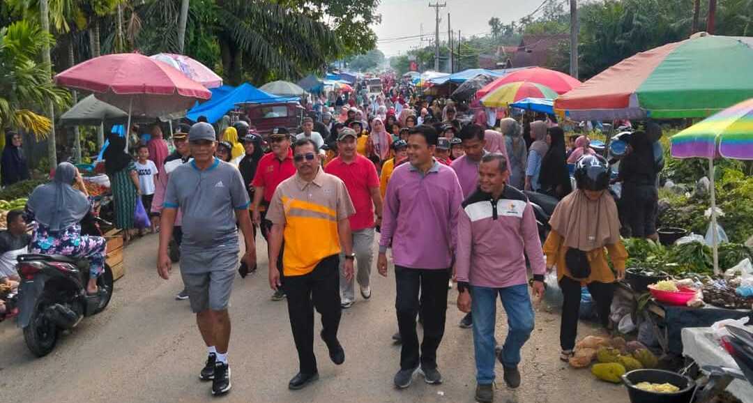 Jalan santai ini HUT Nagari Sungai Duo ke-15 dimulai dari Kantor Wali Nagari Sungai Duo dengan rute Simpang Tugu Sungai Duo dan kembali ke Kantor Wali Nagari Sungai Duo, Minggu (09/02/2025). (Dokumentasi pribadi)