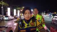 AKBP Ratna Quratul Ainy SIK. MSi., bersama Kasat Lantas Kasat Lantas AKP Lingga Ramadhani STK. SIK. saat memantau langsung situasi arus di rest area KM 456 jalur B wilayah Kec. Pabelan Kab. Semarang./Dok.Foto.Jk_Zed.(jurnalterkini.id/Ponco)