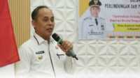 IMG-20250625-WA0030 Ket foto: Bupati Inhil, Haji Herman, saat membuka sosialisasi kemitraan koperasi di Hotel Inhil Pratama, Tembilahan, Rabu (25/6/2025).