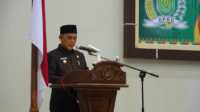 Ket foto: Bupati Inhil, Haji Herman, saat pidato dan menyampaikan laporan hasil pembahasan Panitia Khusus Ranperda di Kantor DPRD Inhil, Senin (4/2025).