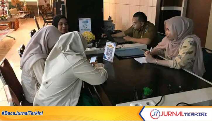 Dinas Penanaman Modal dan Pelayanan Terpadu Satu Pintu (DPMPTSP) Kabupaten Dharmasraya meluncurkan inovasi digital bertajuk SIKEMAD atau Sistem Informasi Kepuasan Masyarakat Online DPMPTSP. (JurnalTerkini.id/brando)