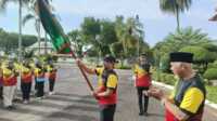 Gubernur Sumbar saat melepas Kontingen Sumbar Ke Pornas Korpri 2025 di Sumsel. (Foto Adpim Sumbar).