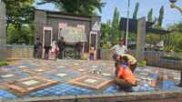 Tugu Gempa di Padang dipercantik pada Sabtu (27/08/2025). (Foto Kominfo Padang).