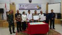 Ket Foto: Bupati Inhil H Herman menyaksikan penandatanganan perjanjian kerja sama Gerai Mal Pelayanan Publik (MPP) antara Pemerintah Kabupaten Inhil dengan sejumlah dinas, lembaga, BUMN, dan BUMD di salah satu aula hotel di Tembilahan, Rabu (8/10/2025).