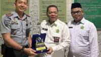 Kalapas Narkotika Sawahlunto, Ressy Setiawan (kiri) bersam Kemenag Sawahlunto. (Foto Istimewa).