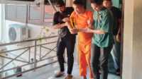 Ket Foto: DPO Iwan Tanjung saat di Bawa ke Mapolres Inhil