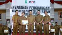 IMG-20260318-WA0002 Ket Foto: Bupati Inhil H Herman menghadiri acara penyerahan penghargaan Desa Percontohan antikorupsi