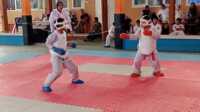 Manly Osaze Doloksaribu, siswa SD Swasta Maitrewirya Tanjung Balai Karimun, berhasil menorehkan prestasi gemilang dalam ajang Festival Olahraga Sedaghe Referee Series III. Ia sukses menyabet Juara 1 pada cabang olahraga (cabor) karate yang digelar di SMA Negeri 1 Karimun, Sabtu (25/4/2026). (dokumentasi pribadi)
