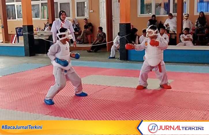 sd maitreyawira juara karate Manly Osaze Doloksaribu, siswa SD Swasta Maitrewirya Tanjung Balai Karimun, berhasil menorehkan prestasi gemilang dalam ajang Festival Olahraga Sedaghe Referee Series III. Ia sukses menyabet Juara 1 pada cabang olahraga (cabor) karate yang digelar di SMA Negeri 1 Karimun, Sabtu (25/4/2026). (dokumentasi pribadi)