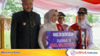 D9zrmXzeLJqAKP3XJNls0TnOMTh7g2dpxQm92Erk-100kb Penyerahan penghargaan kepada pemenang Wali Kota dan Wakil Wali Kota Cilik Kota Padang 2026. (Foto: Pemko Padang)