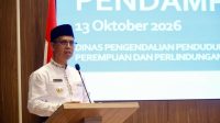 Bupati Karimun Iskandarsyah membuka Pelatihan Trauma Healing dan Pendampingan TPPO di Tanjung Balai Karimun, Selasa (13/10/2026). (foto: diskominfostaper karimun)