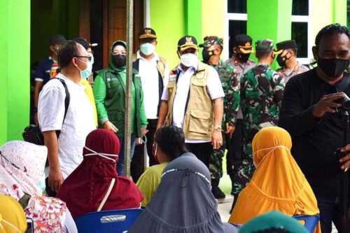 Tinjau vaksinasi massal